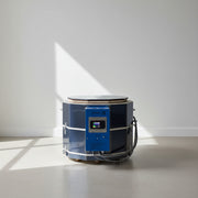 Industrial kiln with open door on a white background