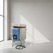 Stainless steel machine with blue control panel on a white background
